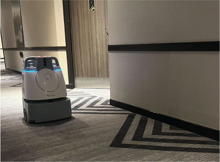 Hotel service robot in a corridor.